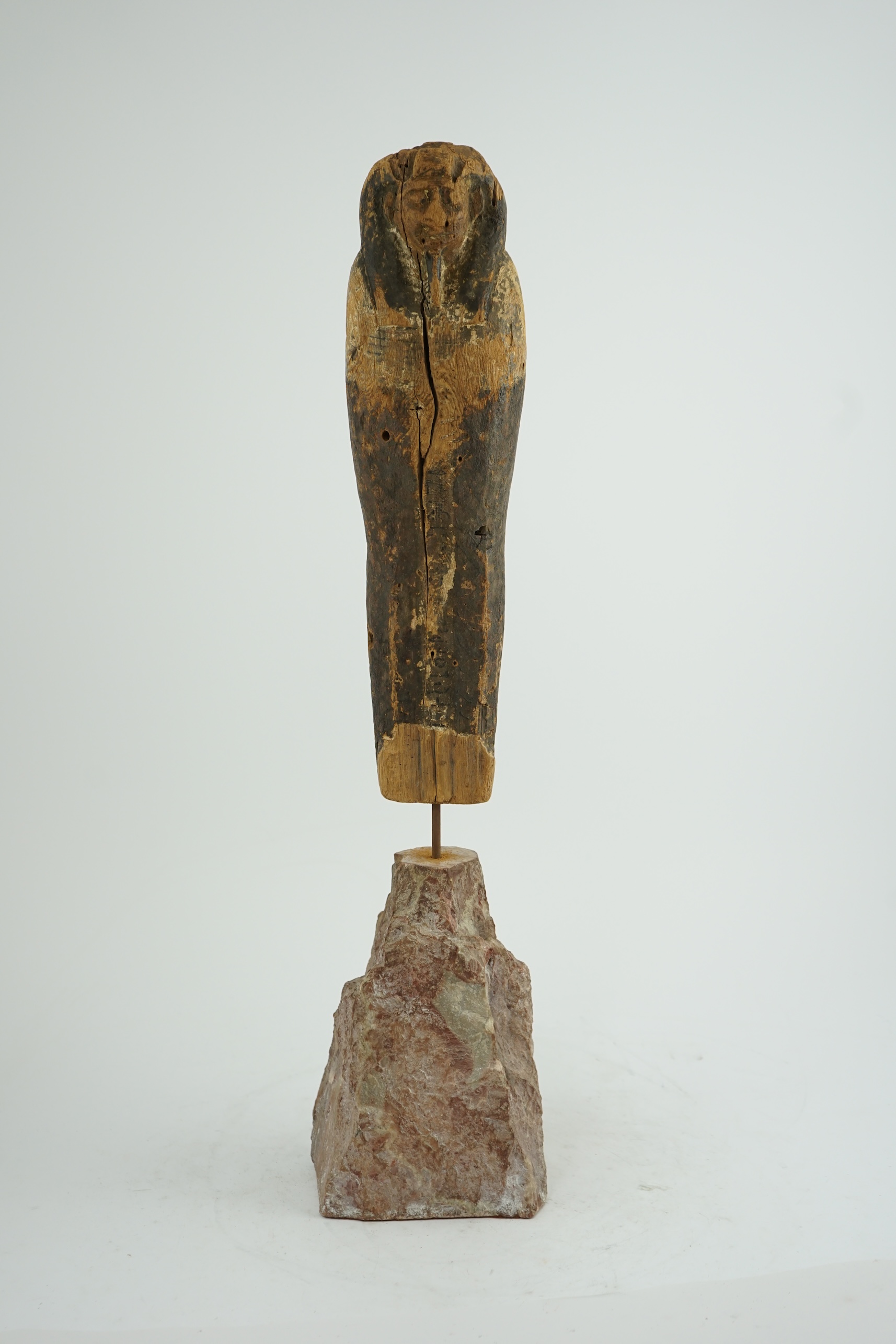 An Ancient Egyptian miniature wood statuette of Ptah-Sokar-Osiris, probably late Kingdom